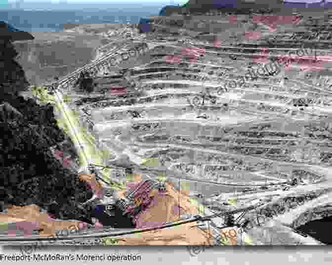 A Breathtaking Aerial View Of The Morenci Mine's Vast Open Pit, Showcasing Its Immense Scale And Engineering Marvel. Morenci Mine: History Of Clifton And Morenci District: Clifton And Morenci District