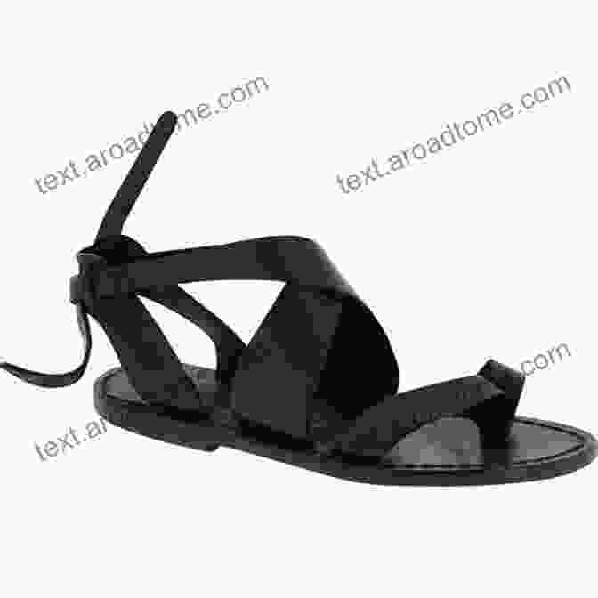 A Pair Of Margo Nash Flat Sandals In Black Leather. High Quality Footwear Sandals Margo Nash