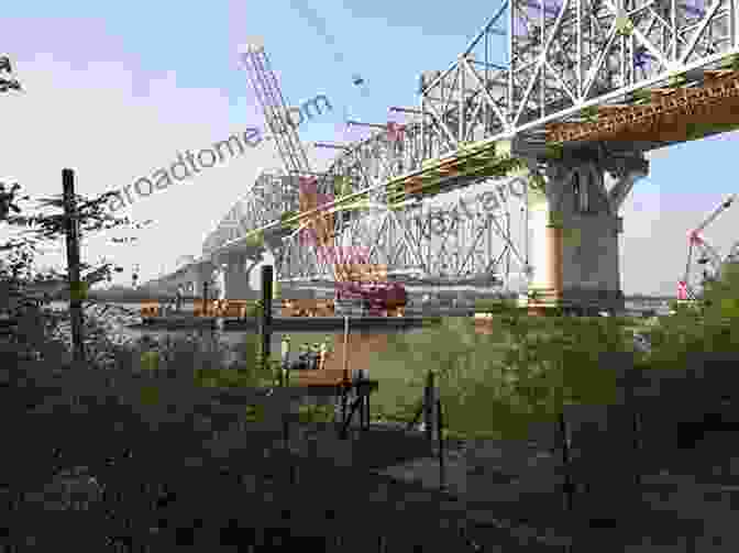 A Panoramic View Of The Huey Long Bridge, Showcasing Its Graceful Art Deco Design And The Vast Expanse Of The Mississippi River. Huey P Long Bridge (Images Of America)