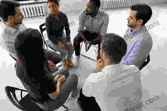 A Therapist And Client Sitting In A Circle, Discussing Their Goals And Values. Beyond Therapy: Igniting Life Focus Community Movements