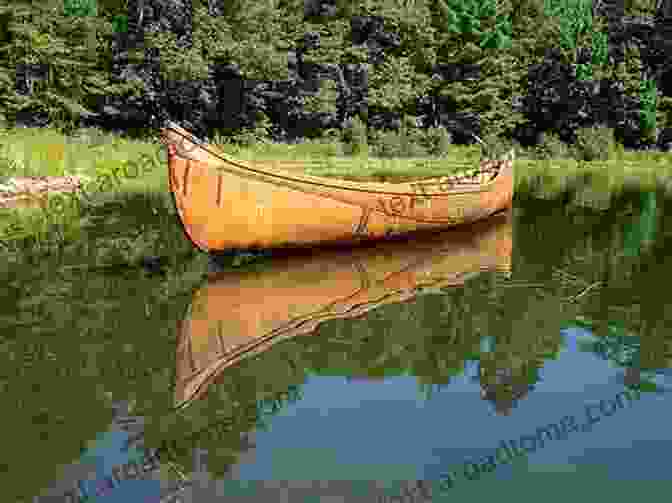 A Wabanaki Man Paddling A Canoe On A Lake Canoe Indians Of Down East Maine (American Heritage)