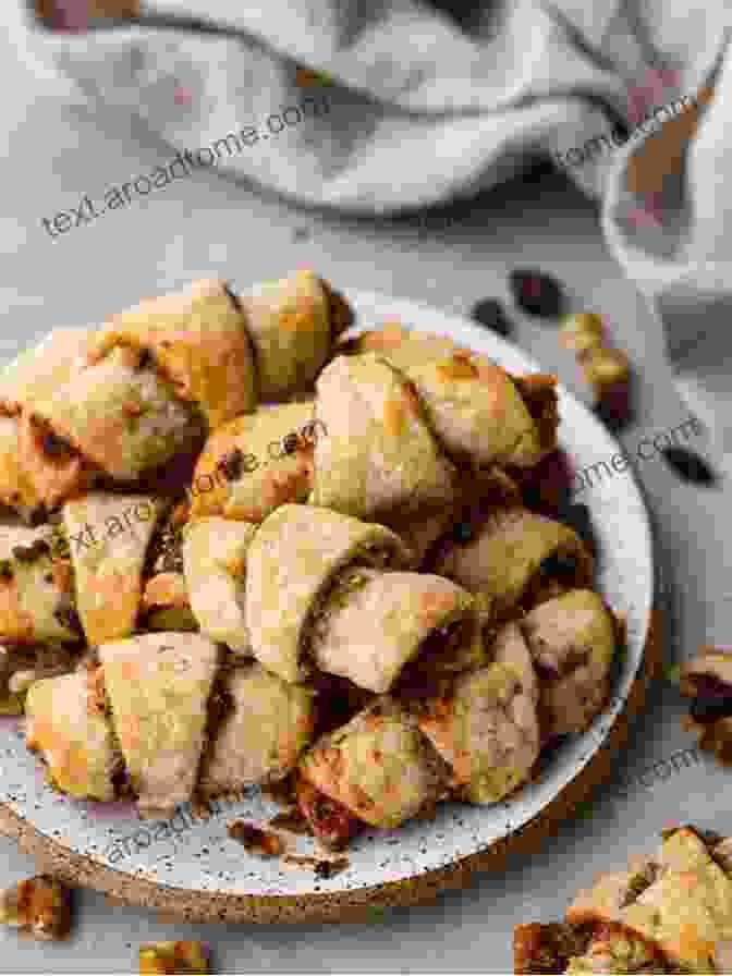 Bite Sized Rugelach Pastries Filled With Nuts, Cinnamon, And Raisins Simple And Delicious Jewish Baker Pastry Secrets Cookbook With Easy Recipes From A New York Baking Legend For Strudel Stollen Danishes Puff Pastry